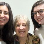 Students Nicole Jozwik and Lily Conover posing with Professor Deborah Johnson after their senior presentations.