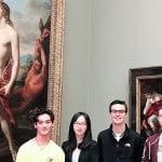 Professor Bing Huang and students standing in the Asian Art wing of the Metropolitan Museum of Art in NYC.